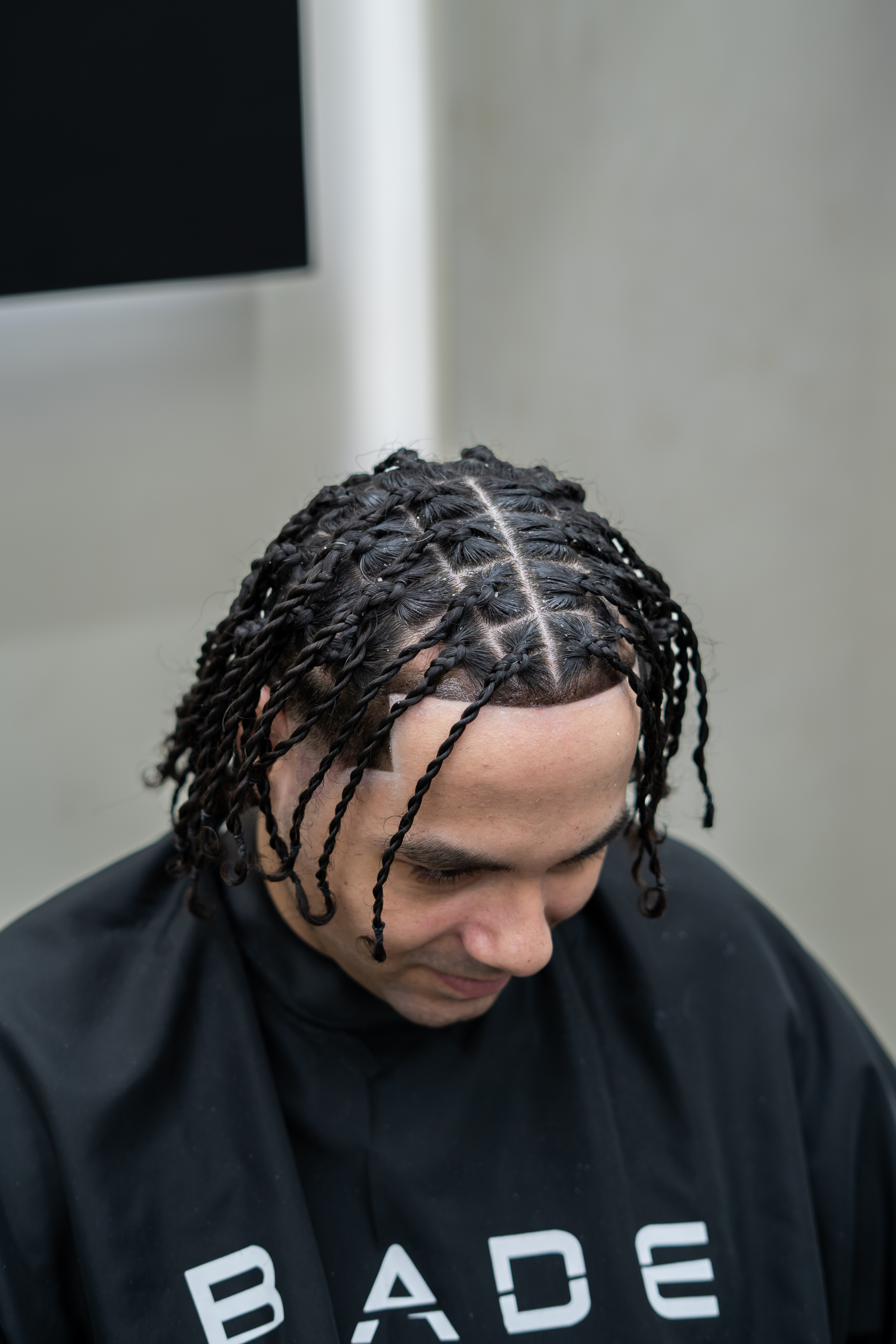 Braids service by Blade Barbers